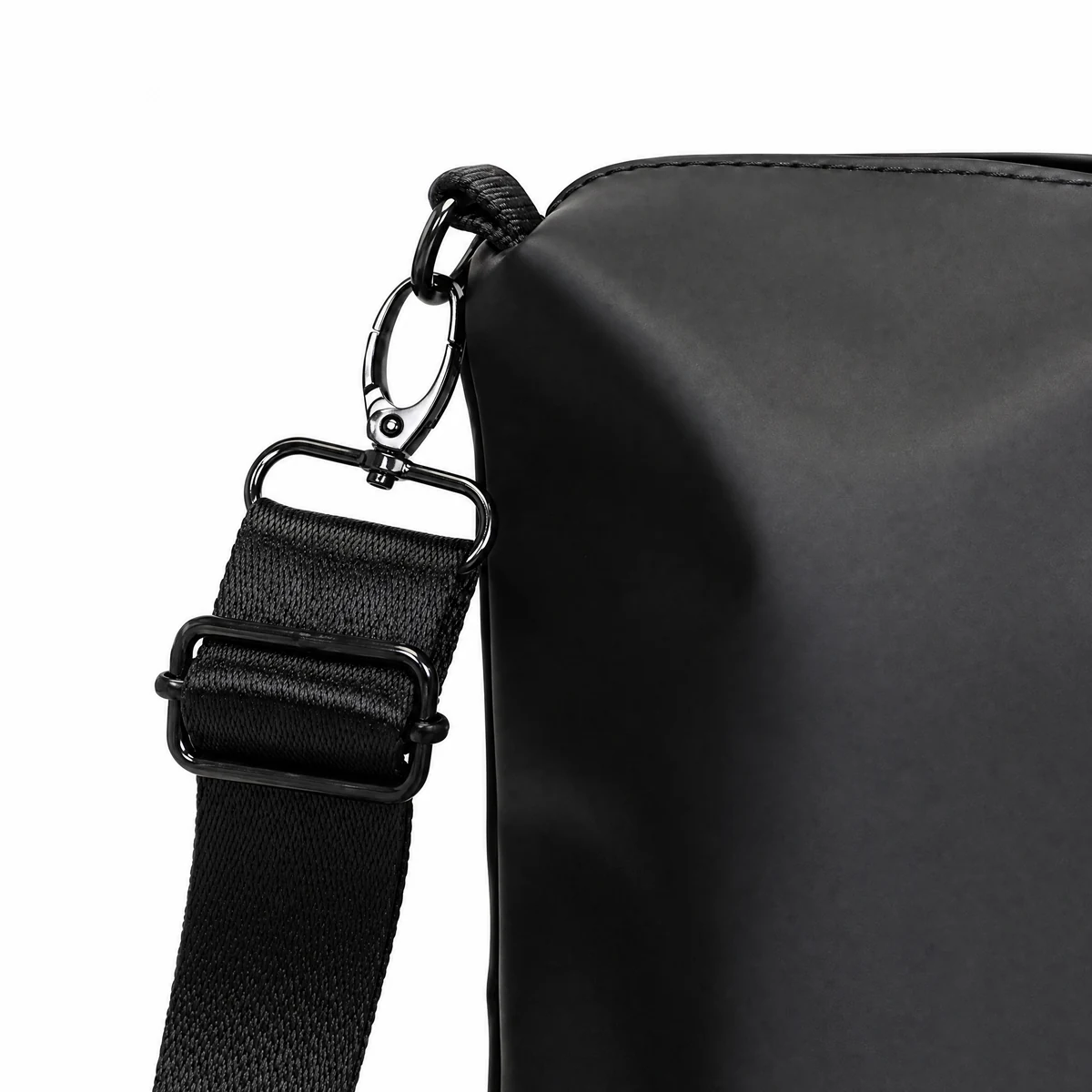Metal swivel clasp and slider holding the shoulder strap